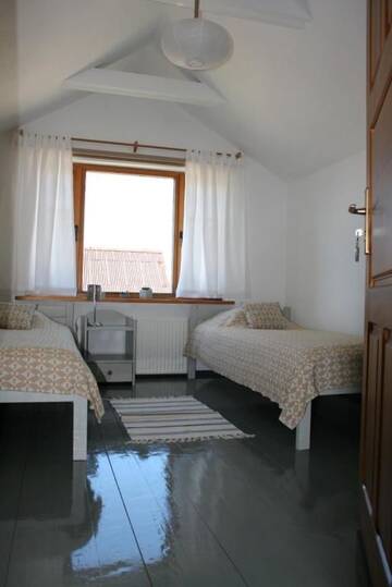 Фото номера Двухместный номер с 2 отдельными кроватями Гостевой дом Guest House Viga г. Павилоста 12
