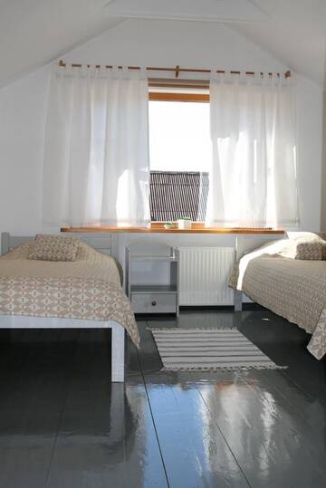 Фото номера Двухместный номер с 2 отдельными кроватями Гостевой дом Guest House Viga г. Павилоста 3